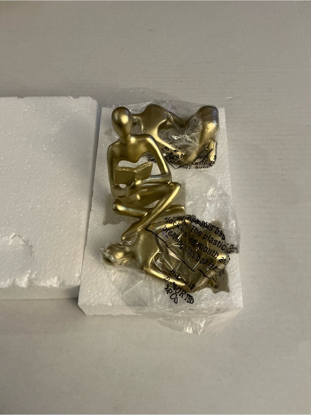 Gold Abstract Reading Figure Sculpture